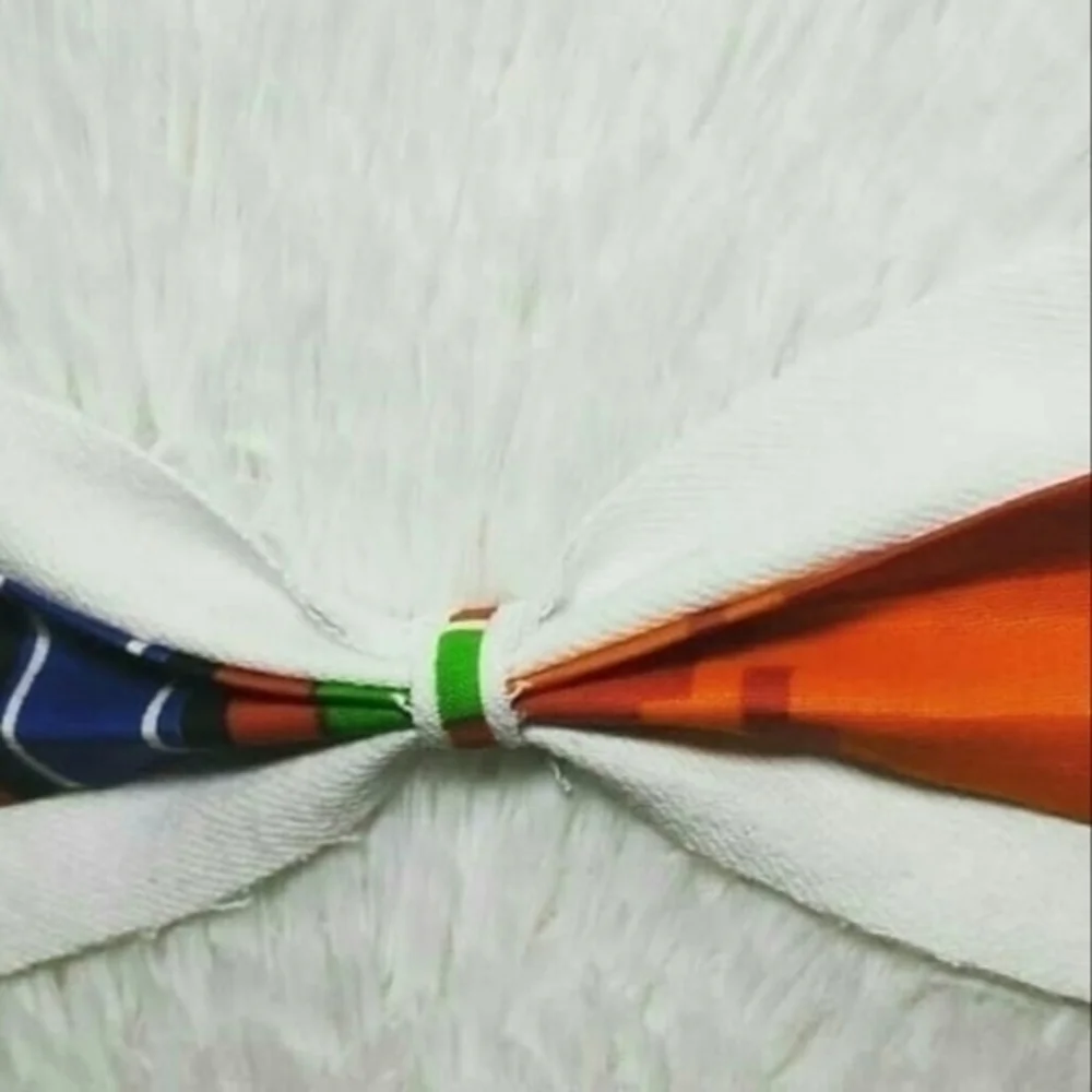 Tasty Raw Edge White Denim & Kente Bow Collar Pin